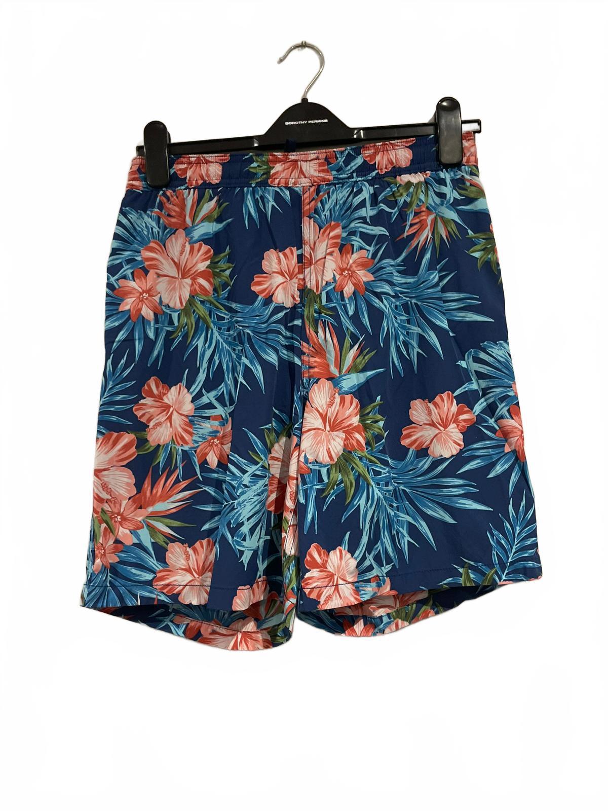 Kirkland blue flowery swim shorts, size small