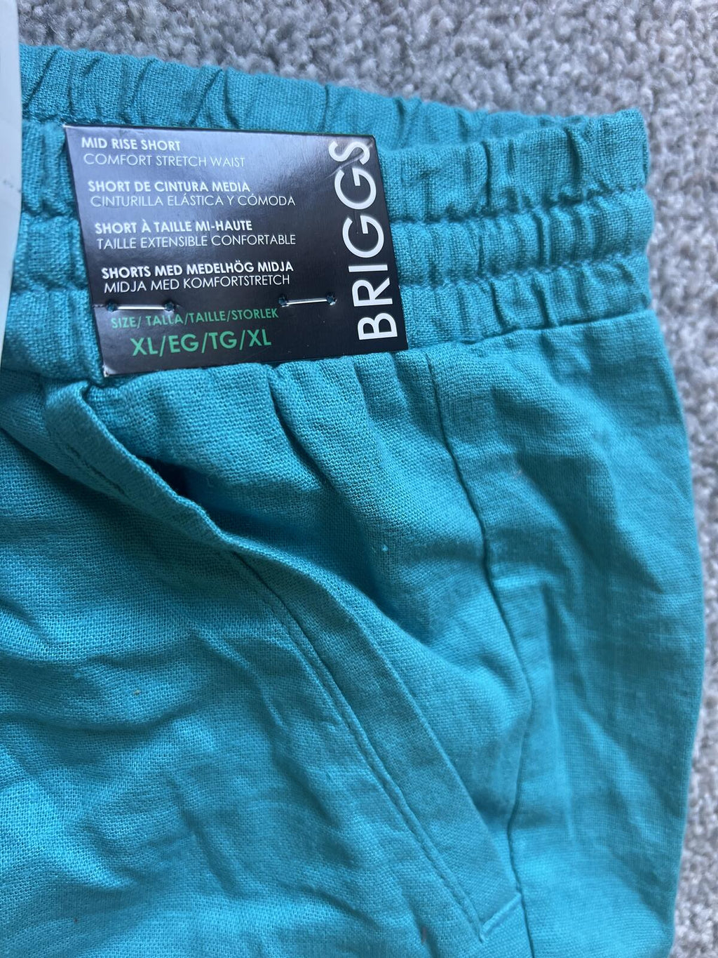 Ladies teal mid rise shorts, size XL