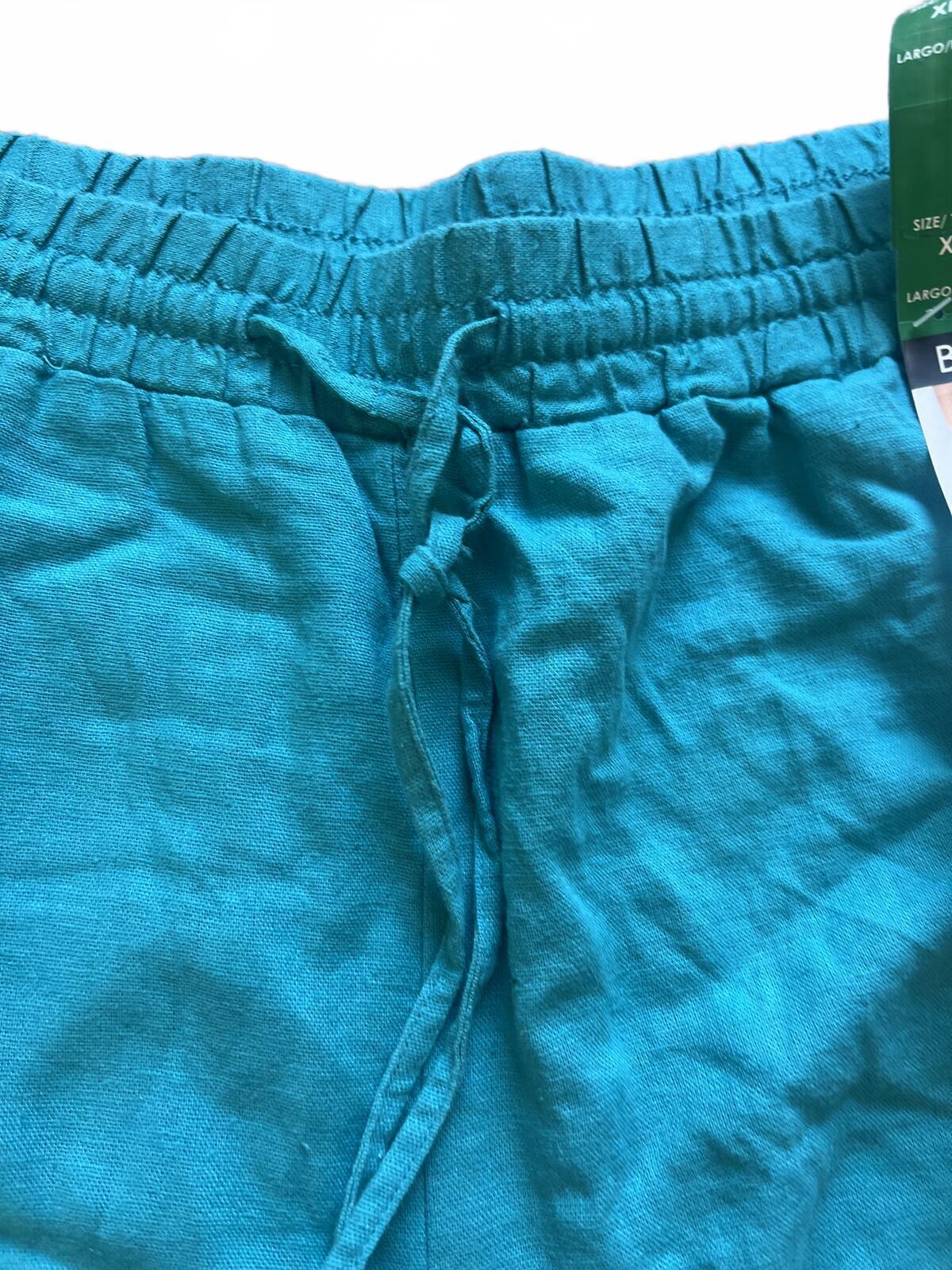 Ladies teal mid rise shorts, size XL