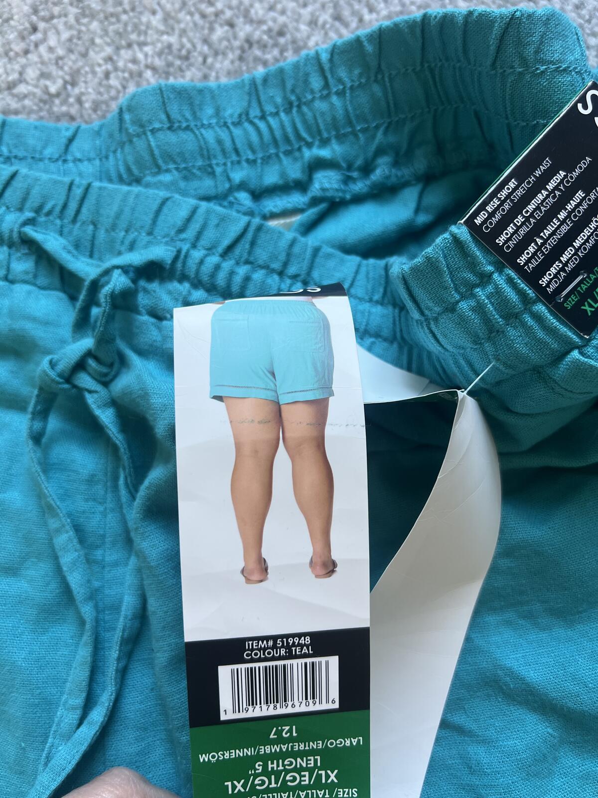 Ladies teal mid rise shorts, size XL