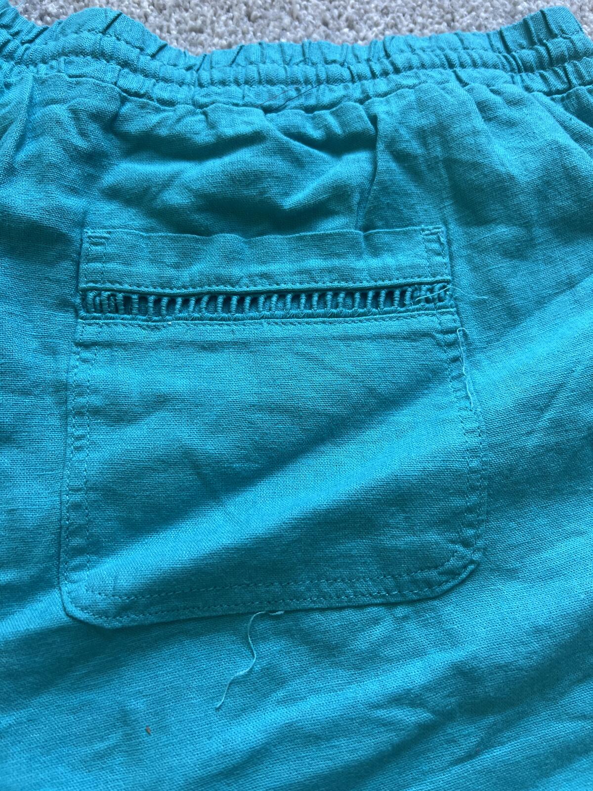 Ladies teal mid rise shorts, size XL