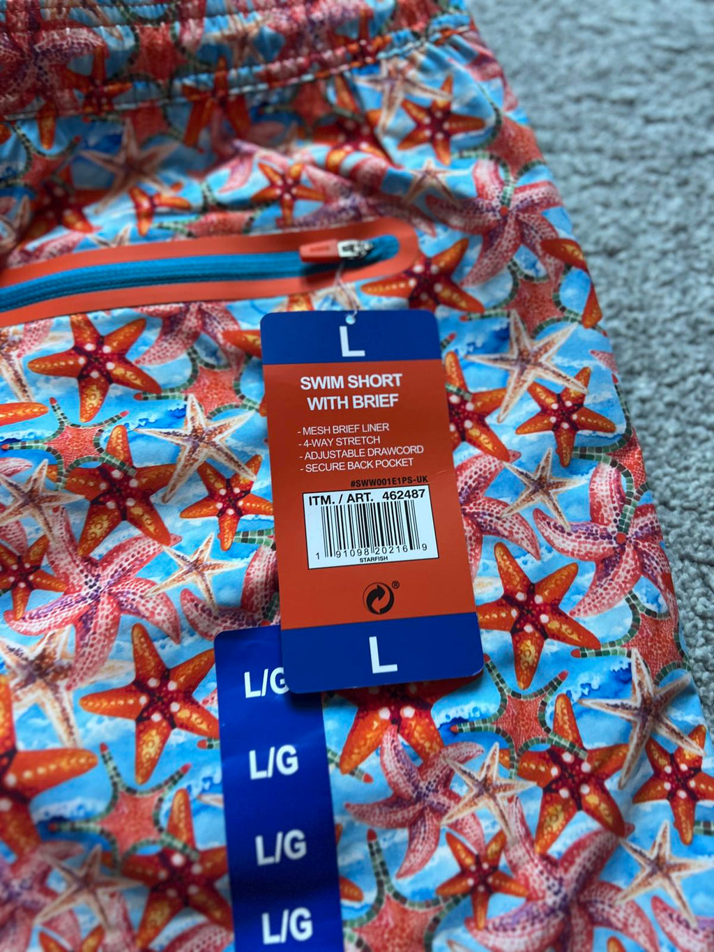 Swims men’s orange swim shorts, size large