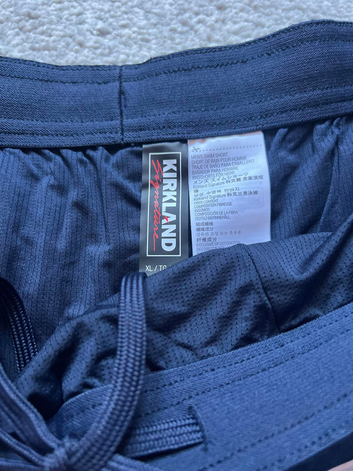 Kirkland men’s blue stripe swim shorts, size XL
