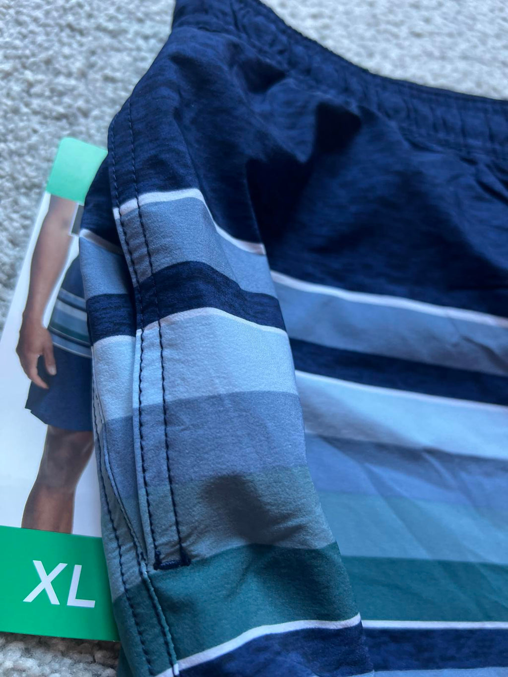 Kirkland men’s blue stripe swim shorts, size XL