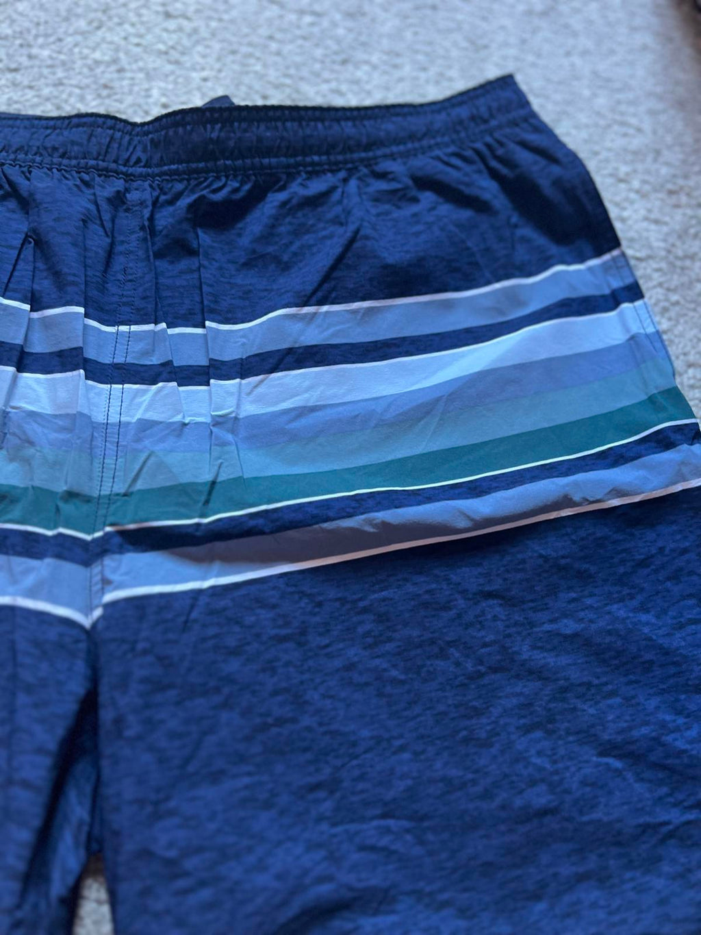 Kirkland men’s blue stripe swim shorts, size XL